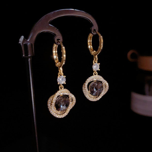 Bông Tai Khoen Tòn Teng 1 Hạt Đá Đen Viền Xoắn Đá Trắng