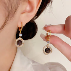 Bông Tai Khoen Tòn Teng 1 Hạt Đá Đen Viền Xoắn Đá Trắng