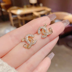 Bông Tai Chữ X Đính Đá Sang Chảnh Sát Tai