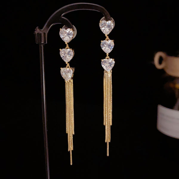 BÔNG TAI TÒN TENG 3 TIM ĐÁ PHỐI TUA RUA DÁNG DÀI