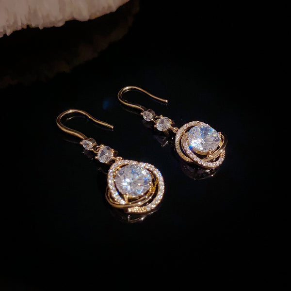 BÔNG TAI TÒN TENG VIỀN XOẮN DÁNG HOA ĐÁ TRÒN TRẮNG DẠNG MÓC