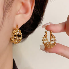 BÔNG TAI KHOEN DÁNG TÚI XÁCH PHỐI ĐÁ NÂU TRÀ CÁ TÍNH