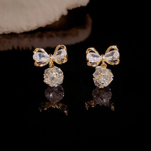 BÔNG TAI TÒN TENG HÌNH NƠ ĐÍNH ĐÁ PHỐI ĐÁ LẬP PHƯƠNG XINH XẮN