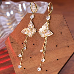 BÔNG TAI KHOEN TÒN TENG HÌNH BƯỚM 3D ĐÍNH ĐÁ PHỐI TUA RUA DÁNG DÀI