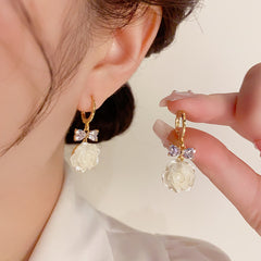 Bông Tai Khoen Tòn Teng Nơ Đá Phối Hoa Hồng Trắng