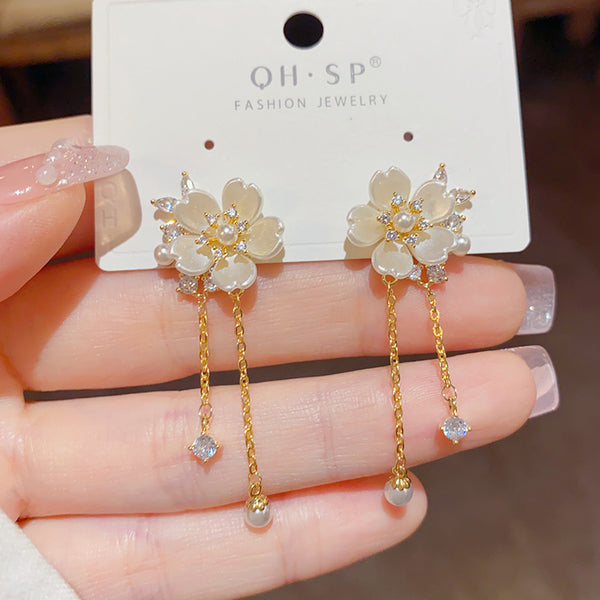 Bông Tai Tòn Teng Hoa Mai Xà Cừ Trắng Phối Tua Rua Đá