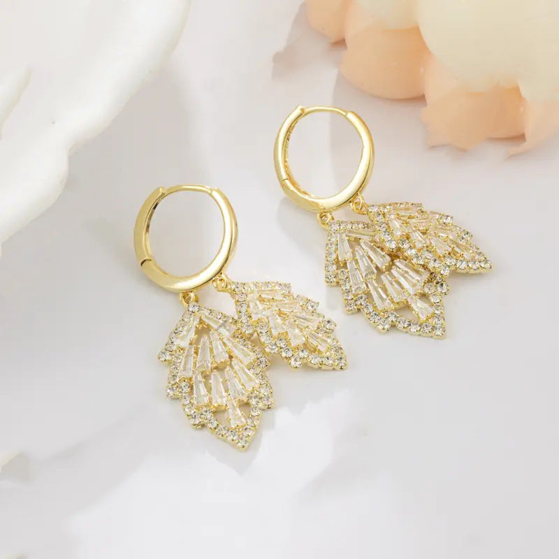 BÔNG TAI KHOEN TÒN TENG LÁ ĐÔI PHỐI ĐÁ SÁNG