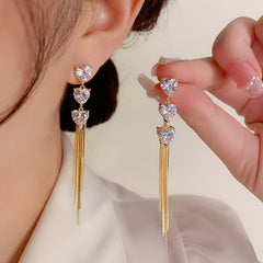 BÔNG TAI TÒN TENG 3 TIM ĐÁ PHỐI TUA RUA DÁNG DÀI