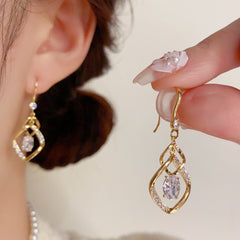 BÔNG TAI TÒN TENG DÁNG THOI ĐÔI XOẮN ĐÁ OVAL DẠNG MÓC