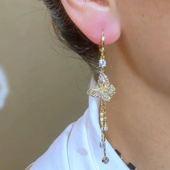 BÔNG TAI KHOEN TÒN TENG HÌNH BƯỚM 3D ĐÍNH ĐÁ PHỐI TUA RUA DÁNG DÀI