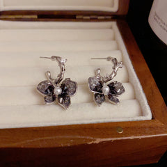 BÔNG TAI TÒN TENG HÌNH NƠ ĐÁ LOANG XÁM ĐEN ĐỘC ĐÁO