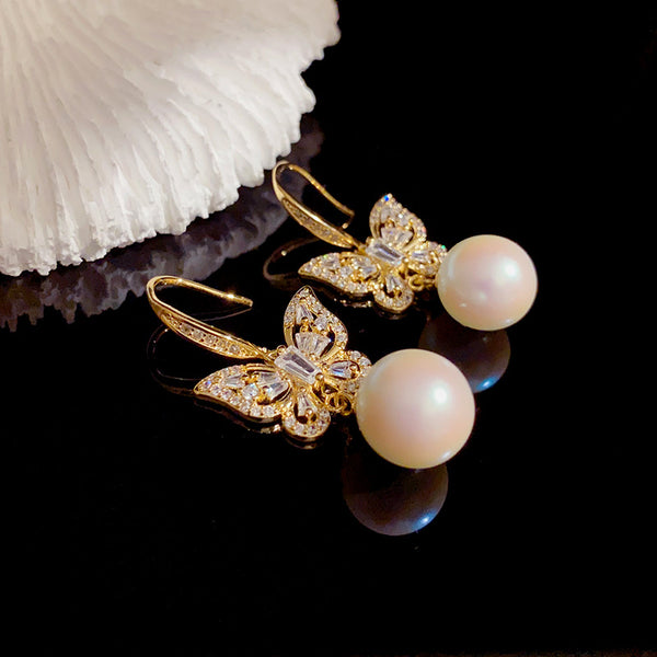 BÔNG TAI TÒN TENG BƯỚM ĐÍNH ĐÁ TRẮNG PHỐI HẠT TRAI SANG TRỌNG DẠNG MÓC