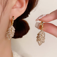 BÔNG TAI KHOEN TÒN TENG LÁ ĐÔI PHỐI ĐÁ SÁNG