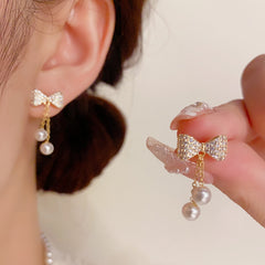 BÔNG TAI TÒN TENG NƠ ĐÍNH ĐÁ TRẮNG PHỐI 2 SỢI NỮ TÍNH