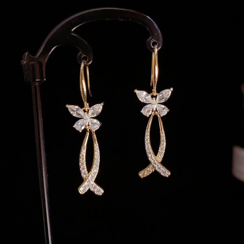 BÔNG TAI TÒN TENG HÌNH BƯỚM ĐÁ X TRẮNG DẠNG MÓC