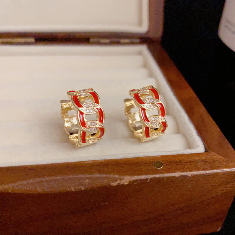 BÔNG TAI KHOEN MX PHỐI ĐÁ PHỦ MÀU ĐỎ CÁ TÍNH