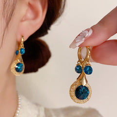 BÔNG TAI KHOEN TÒN TENG MẶT ĐÁ TRÒN COBAN VIỀN PHỐI LƯỚI ĐÁ SÁNG ĐỘC ĐÁO