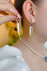 Bông Tai Tòn Teng X Đá Tím Phối Tua Rua Vàng