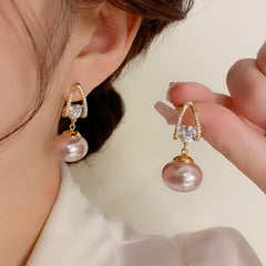 Bông Tai Tòn Teng Đá Trái Tim Phối Hạt Trai Hồng