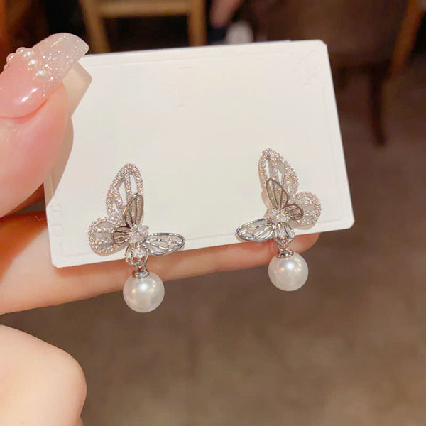 Bông Tai Tòn Teng Cánh Bướm 3D Đính Đá Trắng Phối Hạt Trai Sang Trọng