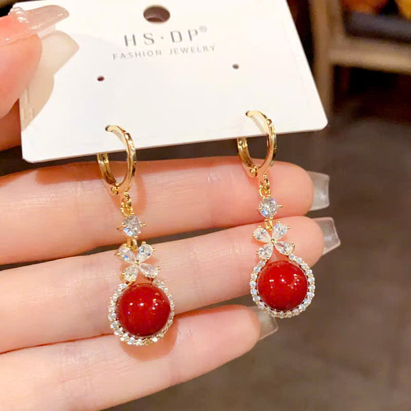 BÔNG TAI KHOEN TÒN TENG 1 HẠT TRAI ĐỎ PHỐI HOA ĐÁ 4 CÁNH VIỀN ĐÁ THỜI TRANG