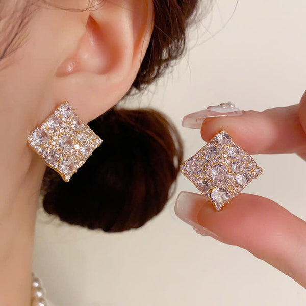 BÔNG TAI HÌNH THOI DM PHỦ ĐÁ TRẮNG CAO CẤP SÁT TAI