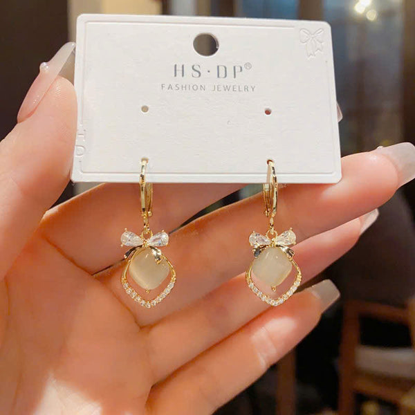 BÔNG TAI KHOEN TÒN TENG NƠ ĐÁ PHỐI THOI MẮT MÈO XINH XẮN