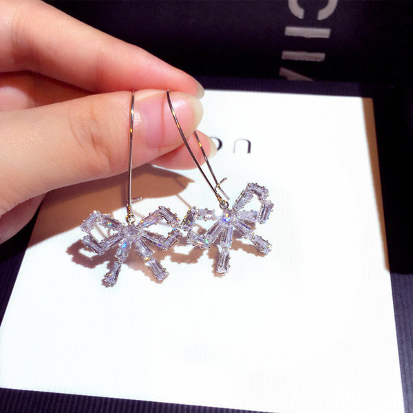 Bông Tai Khoen Nơ Đá Trắng Tòn Teng