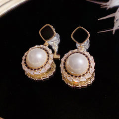 Bông Tai Tòn Teng Thoi Đen Phối Ngọc Trai Tròn Viền Đá