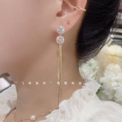 Bông Tai Tòn Teng 2 Hạt Đá Trắng Phối Tua Rua Vàng