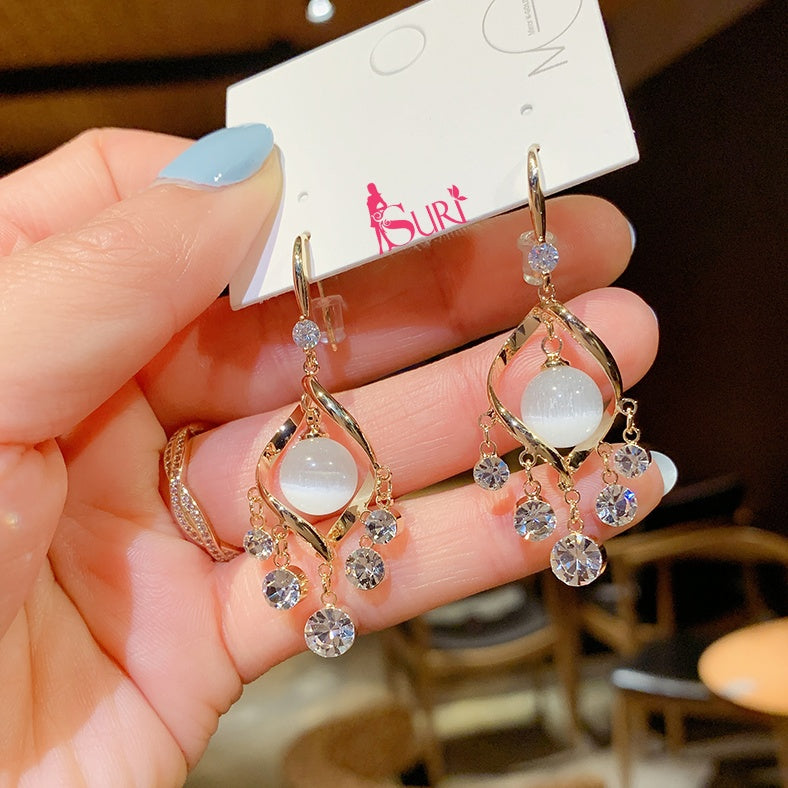 Bông Tai Tòn Teng Xoắn Vàng Hạt Đá Mắt Mèo Phối Tua Rua Đá Dạng Móc