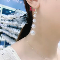 Bông Tai Tòn Teng Dáng Dài 4 Hạt Trai Phối Nơ Đá Dạng Móc