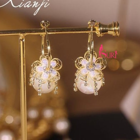 Bông Tai Tòn Teng Khoen Tròn Phối Hoa Đá 5 Cánh Tua Rua 1 Hạt Ngọc Trai Lạ Mắt