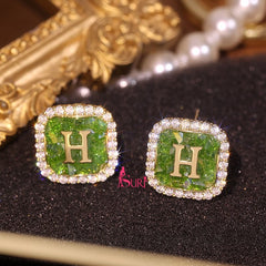 Bông Tai Hình Vuông Đính Đá Xanh Phối Chữ H Vàng Sát Tai