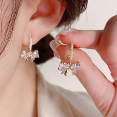 Bông Tai Nơ Đá SR135 Phối 1 Hàng Ngọc Trai Sát Tai