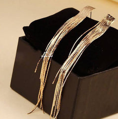 Bông tai tòn teng phom dài cho nàng dự tiệc