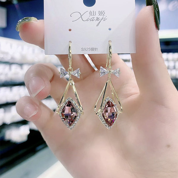 Bông Tai Tòn Teng Nơ Đá Trắng Phối Hình Thoi Đá Tím Viền Đá Trắng Dạng Móc