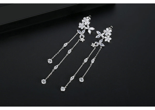 Bông Tai Tòn Teng Tua Rua Hoa Đá Trắng