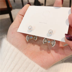 Bông Tai Nơ Đá Xám Viền Đá Đính Ngọc Trai