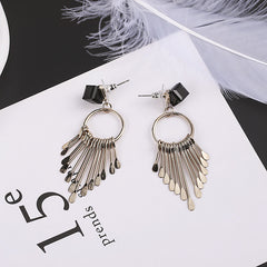 Bông tai tua rua hình học