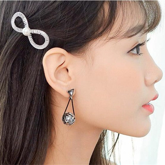 Bông tai tòn teng hạt châu