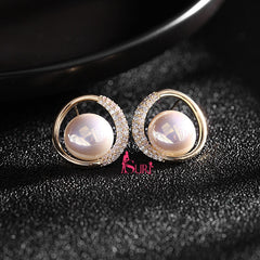 Bông Tai Tòn Teng Hạt Châu Trắng 2 Lá Vàng Viền Đá Dạng Móc