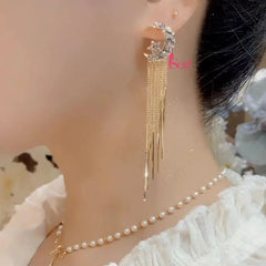 Bông Tai Tòn Teng Trăng Sao Nhỏ Đính Đá Tua Rua Vàng