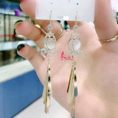 Bông Tai Tòn Teng Tua Rua Vàng Dáng Hoa Sen Đính Đá Dạng Móc