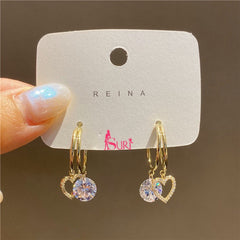 Bông Tai Tòn Teng Khoen Trái Tim Vàng Phối Đá Tròn Trắng Nữ Tính