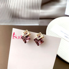 Bông tai hình thoi đính đá xám sát tai