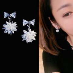 Bông tai nơ đá trắng