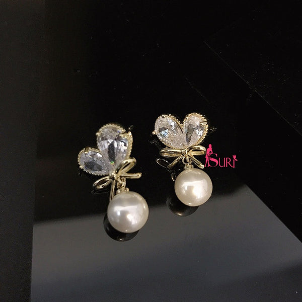 Bông Tai Trái Tim Đá Nơ Vàng Phối Hạt Trai Nữ Tính