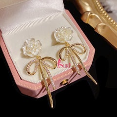 Bông Tai Tòn Teng Hoa Hồng Trắng Phối Nơ Đá