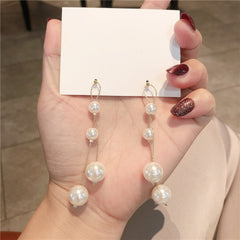 Bông tai tòn teng 4 hạt trai